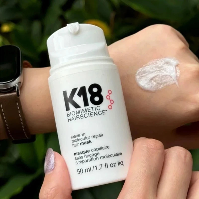K18 Leave-In Molecular Repair Hair Mask 50ml bottle with product texture swatch on hand